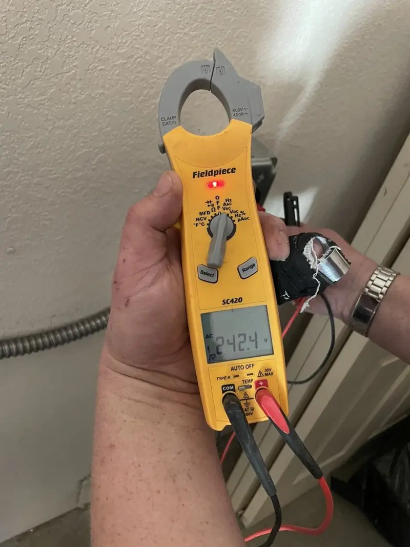 Voltage testing with clamp meter during Generator Installation in Soledad